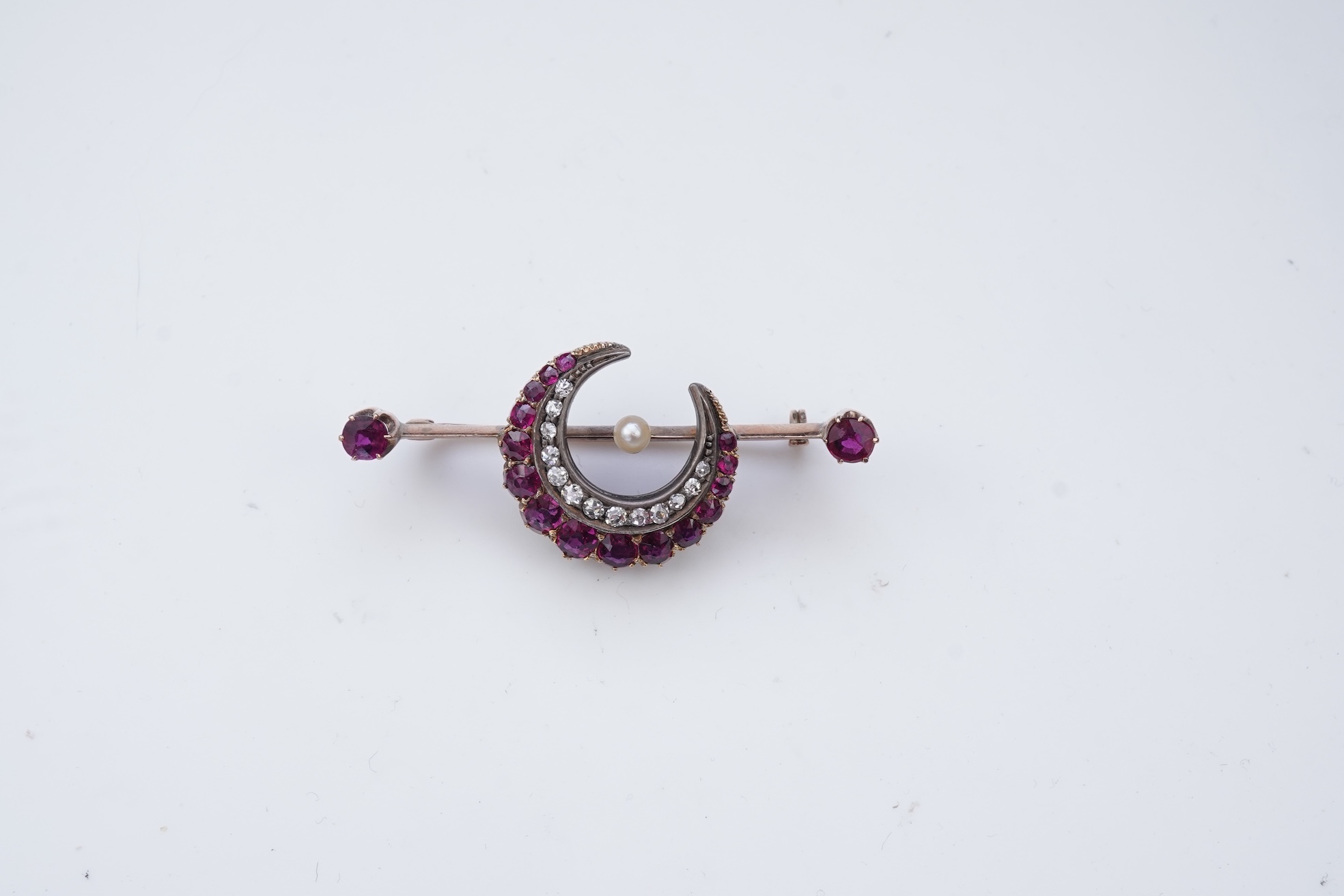 A Victorian ruby and diamond bar brooch, late 19th century